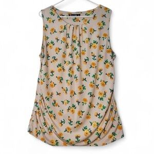 Cream and yellow sleeveless floral print blouse